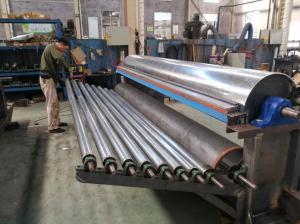 Workers are assembling carding machine