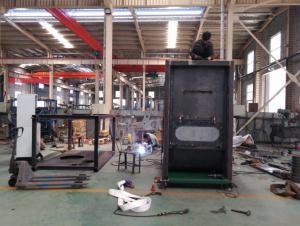 Workers are assembling bale opener