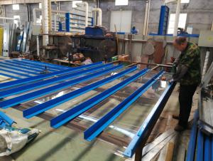 Workers are assembling storage bin